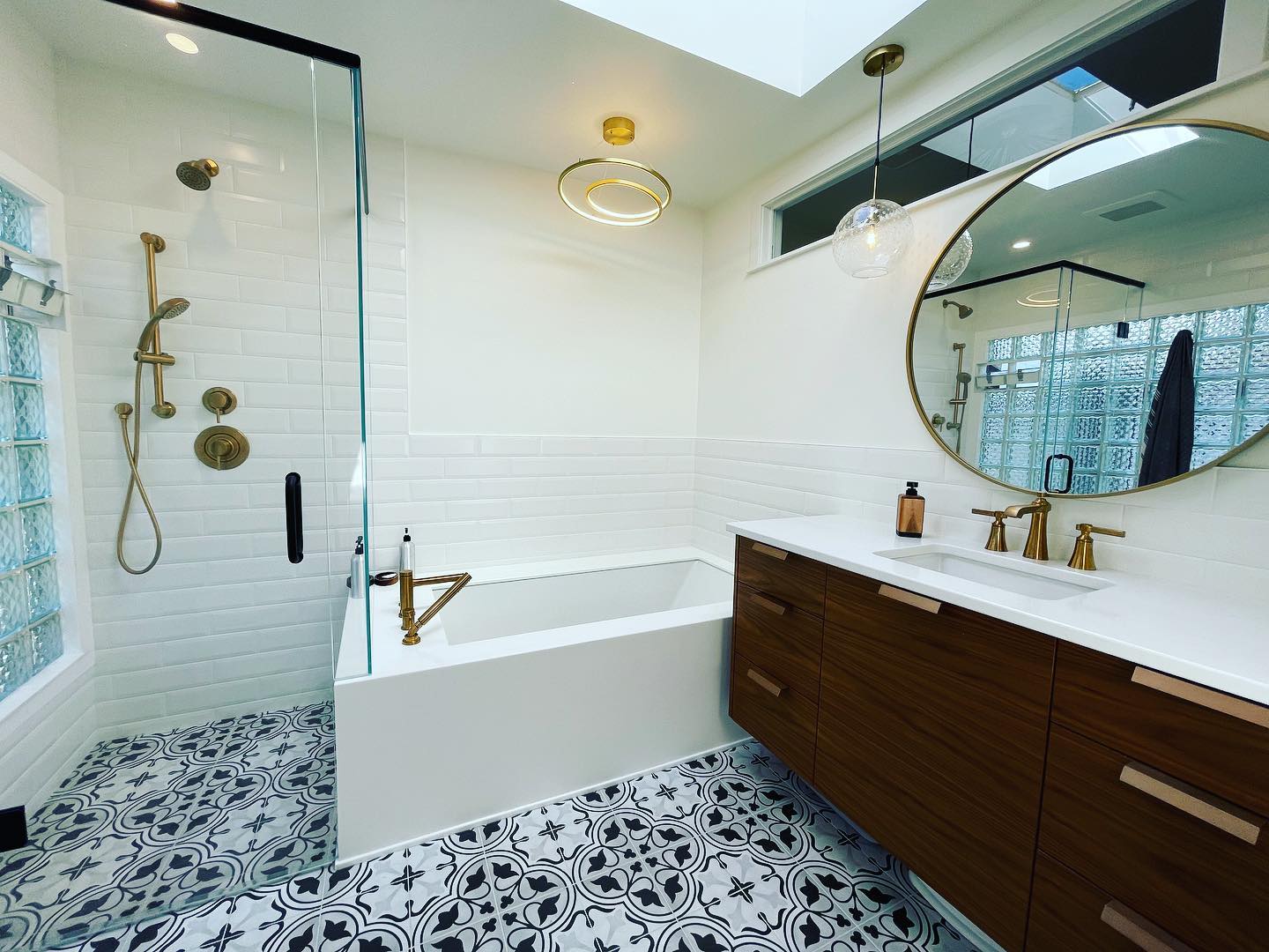 Bright bathroom with an integrated white solid surface vanity countertop